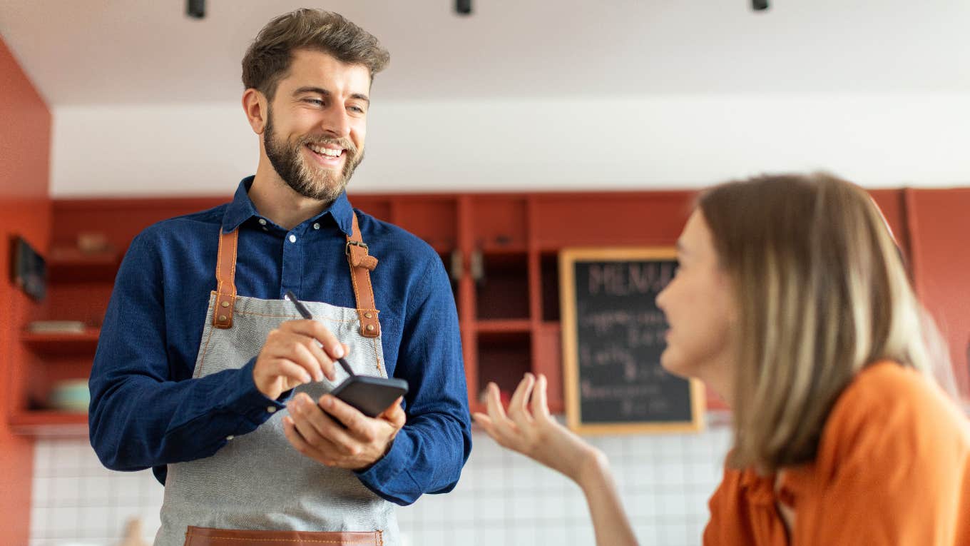 Customer Claims He Tips Based On Service, Not Cost friendly waiter giving great service to customer