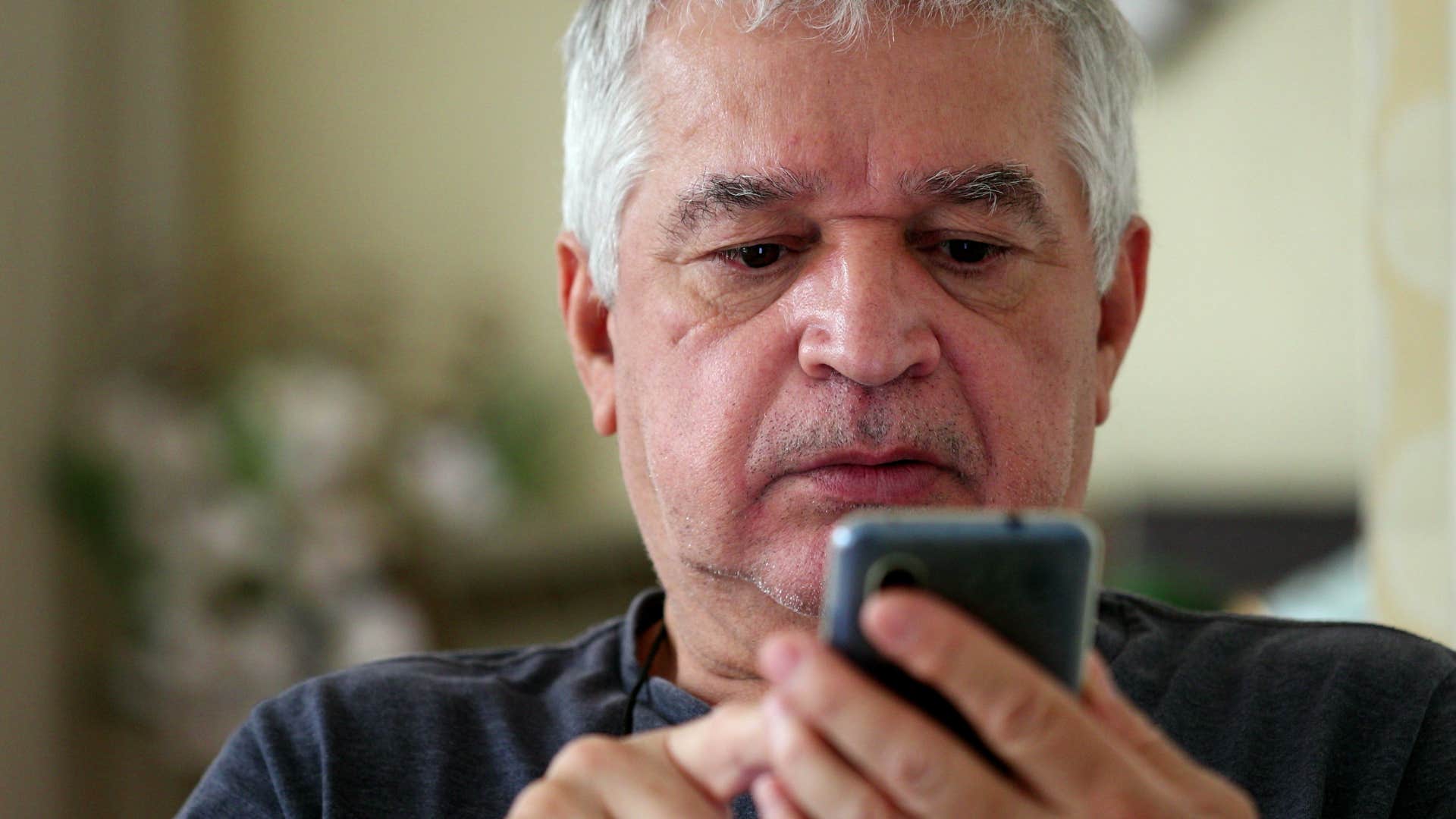 man texting i'm just really busy on his phone