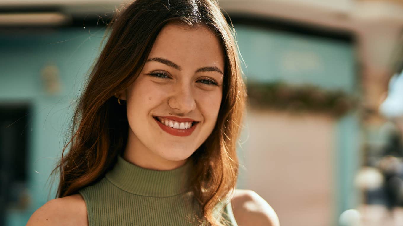 If You Do These Things On A Regular Basis, You're A Better Person Than You Think woman smiling becoming a better person than she thinks