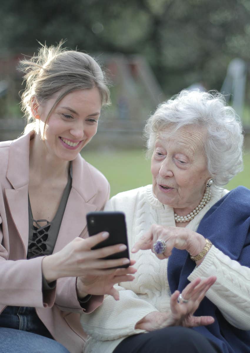 younger woman spending time with an older woman