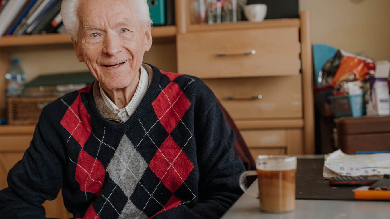 elderly man drinking coffee