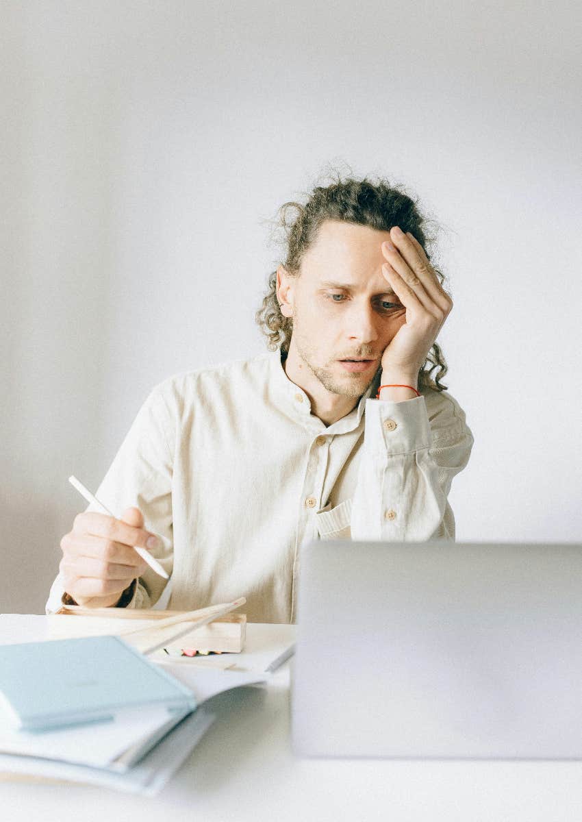 burnt out job seeker looking at ridiculous job description