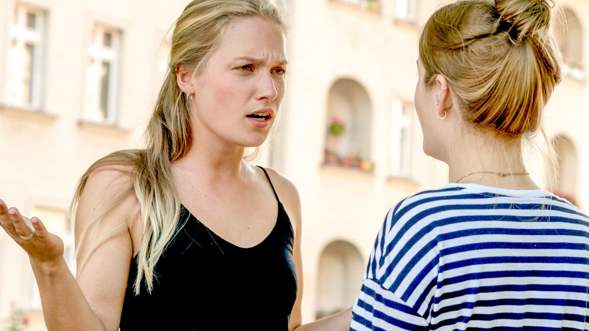 everyday behaviors that quietly reveal someone feels insecure around you they appear defensive