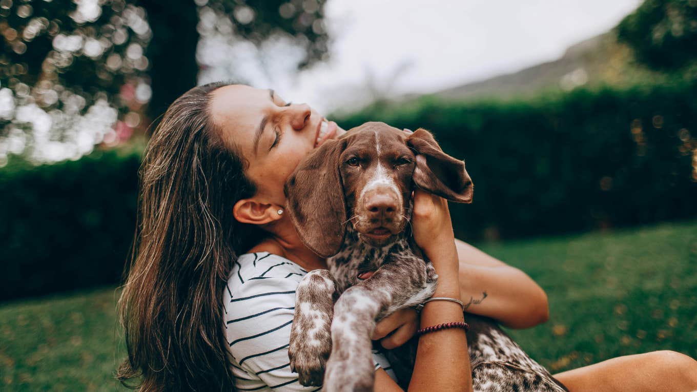 everyday things make dog feel respected woman doing things make dog feel respected