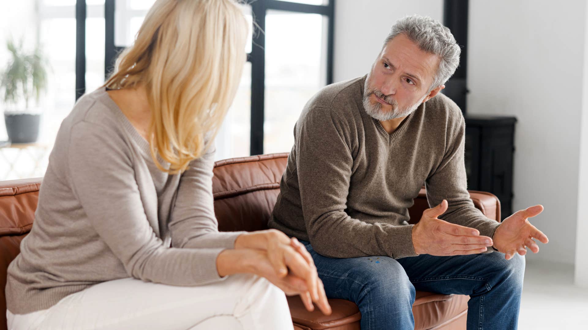 husband avoiding vulnerability and talking to his wife