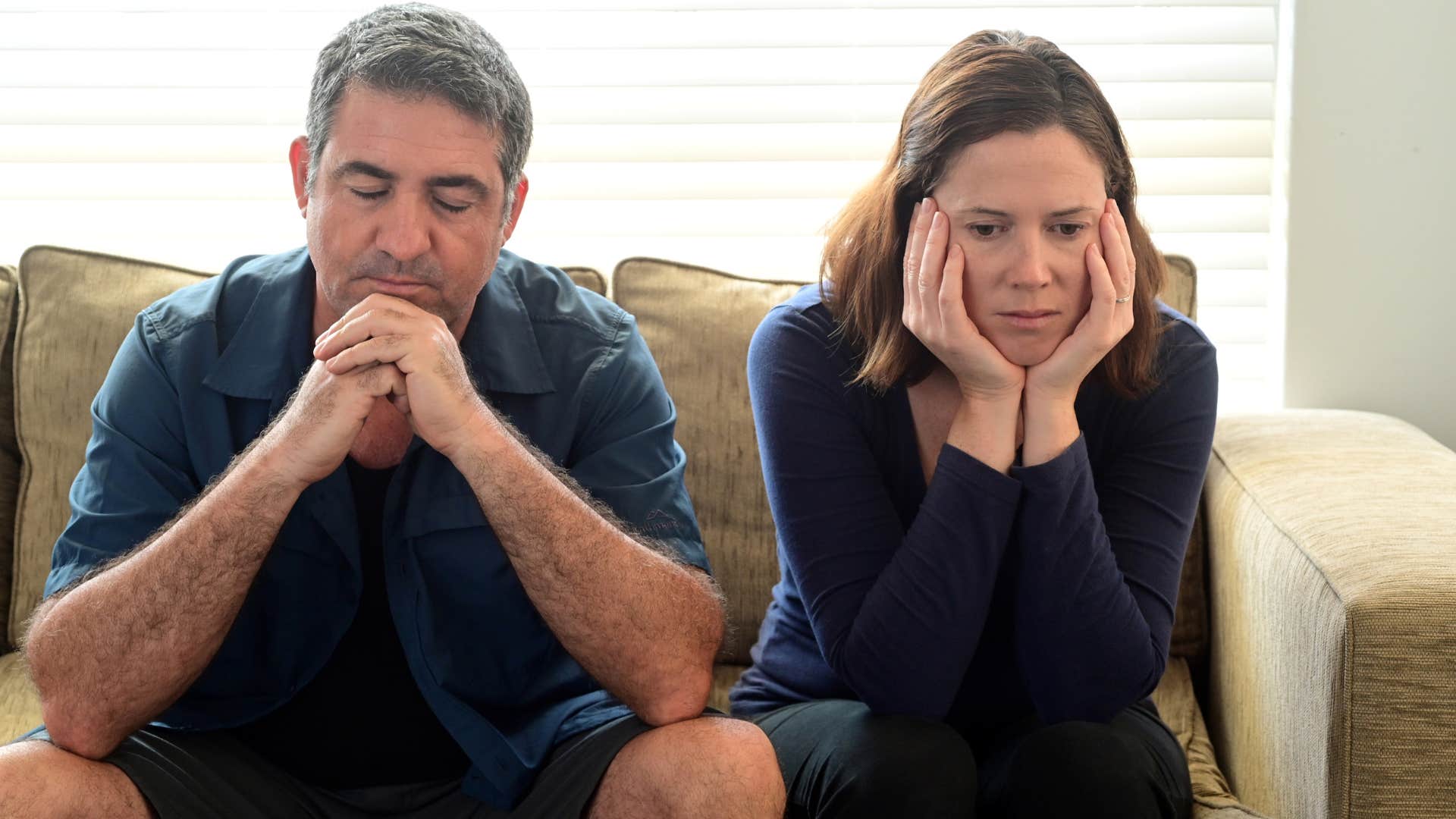 man not listening to his wife at home