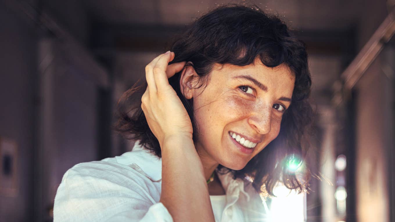 If You’ve Got A Tiny Hole Near Your Ear, You May Have One Of These Rare Qualities  Person touching ear, who has rare qualities.