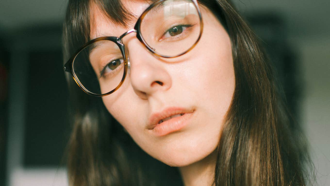 If You Grew Up Broke But Made It, You Still Probably Can't Bring Yourself To Buy These Simple Things serious young woman unwilling to buy simple things for herself