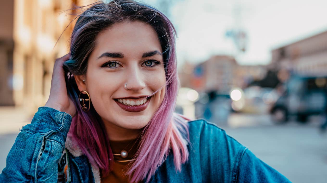 If You Grew Up Poor, You Probably Have These Habits That Make You Way Better Than Normal People young woman who grew up poor forming good habits as an adult
