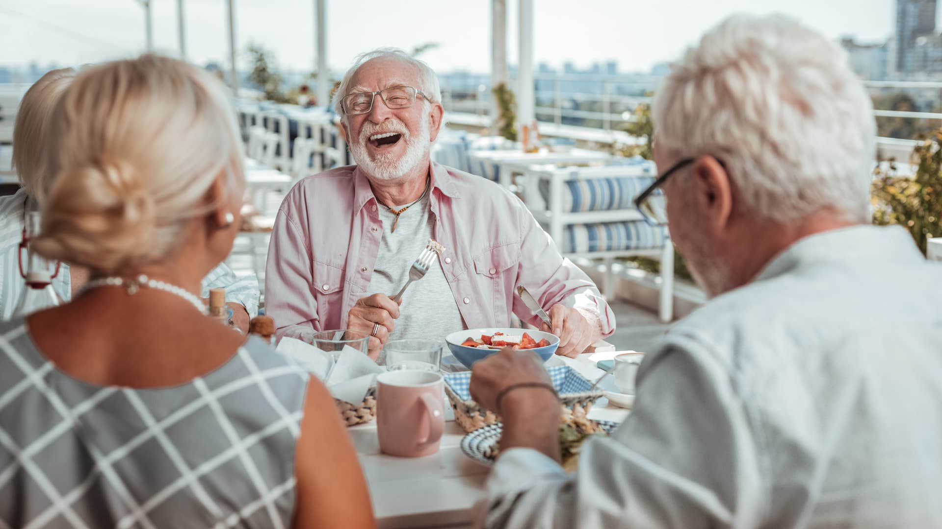 habits Boomers think are considerate but younger generations find draining dinner Happy Boomer eating dinner
