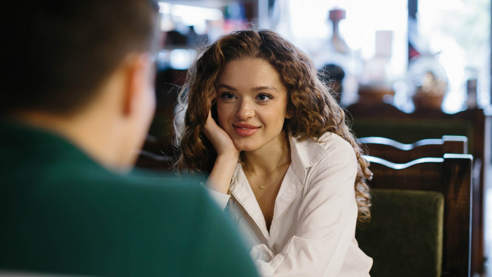 woman who is naturally charming as she finds common ground with man