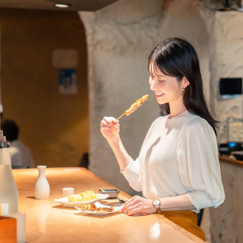 woman who is naturally hopeful as she takes herself to lunch
