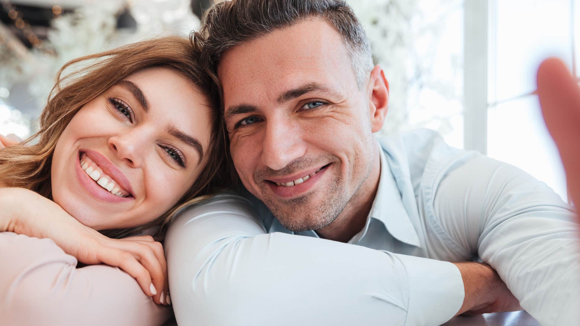 couple with shared values smiling together in selfie