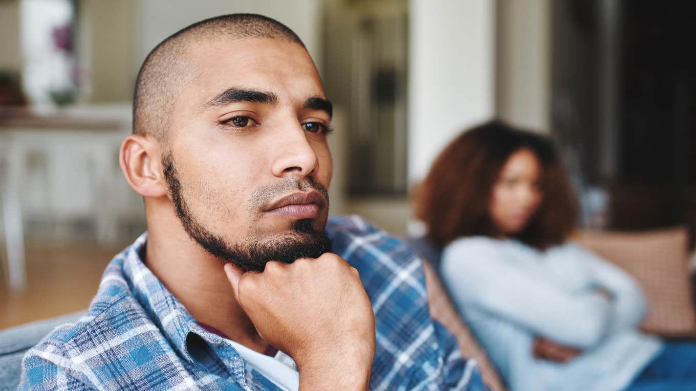 upset husband feeling taken for granted turned away from wife