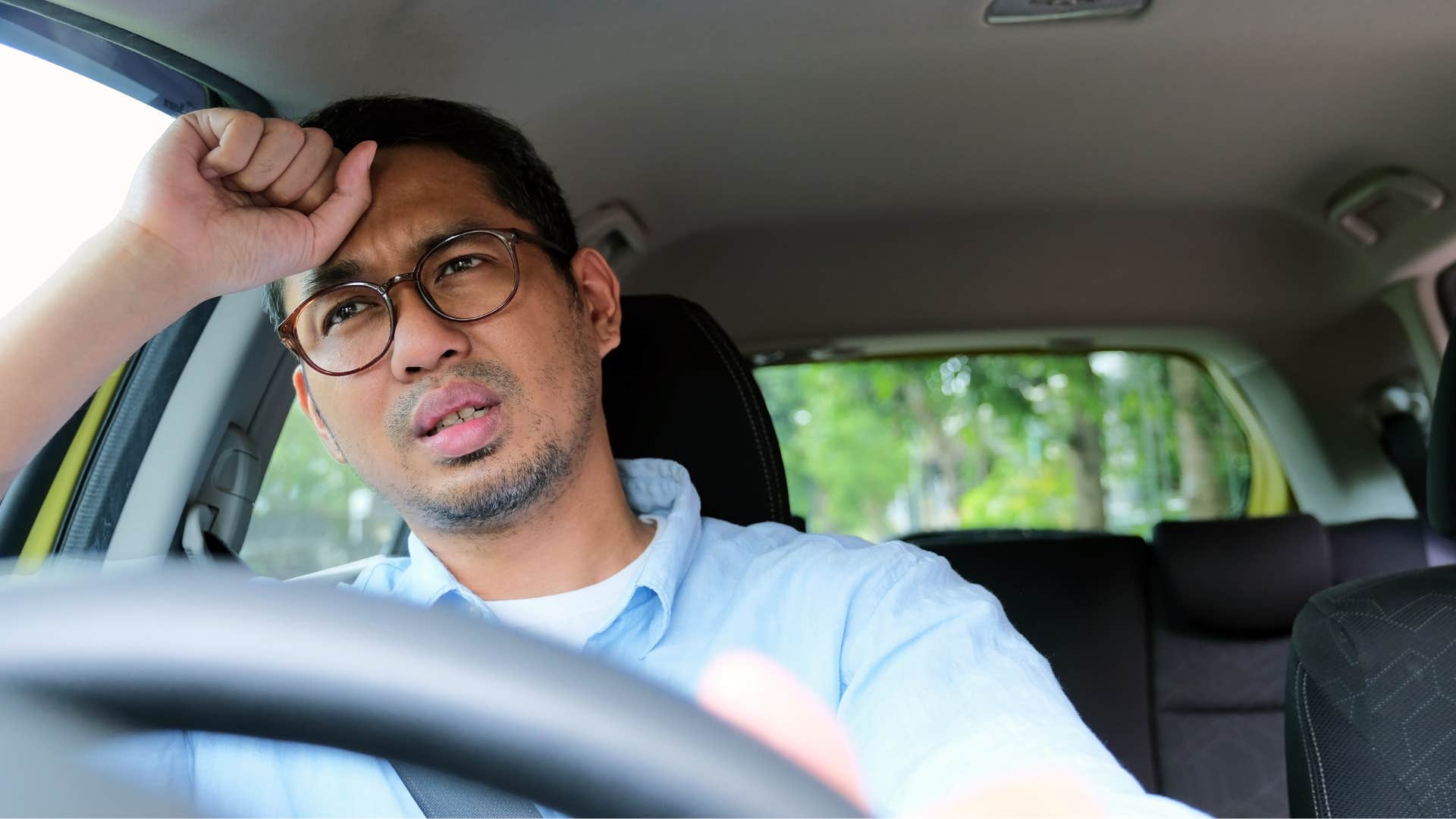 sits in his car if a husband feels more like a paycheck than a partner he'll start doing these things at home man sitting in his car avoiding going home