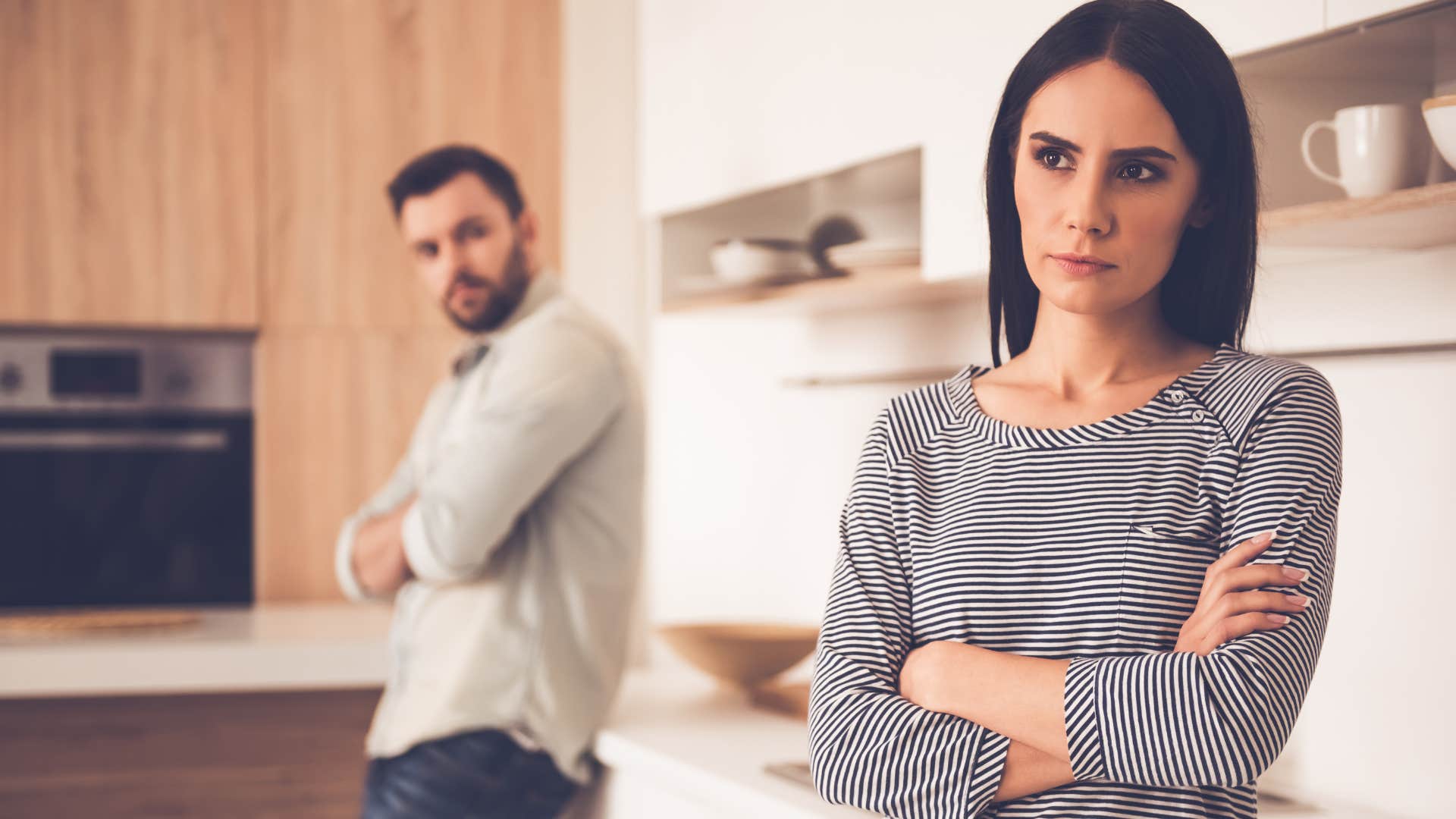 woman turned away from her husband not giving casual compliments