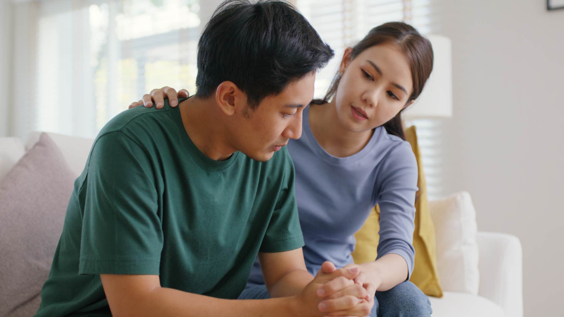 Upset man saying "you don't understand" to his wife.