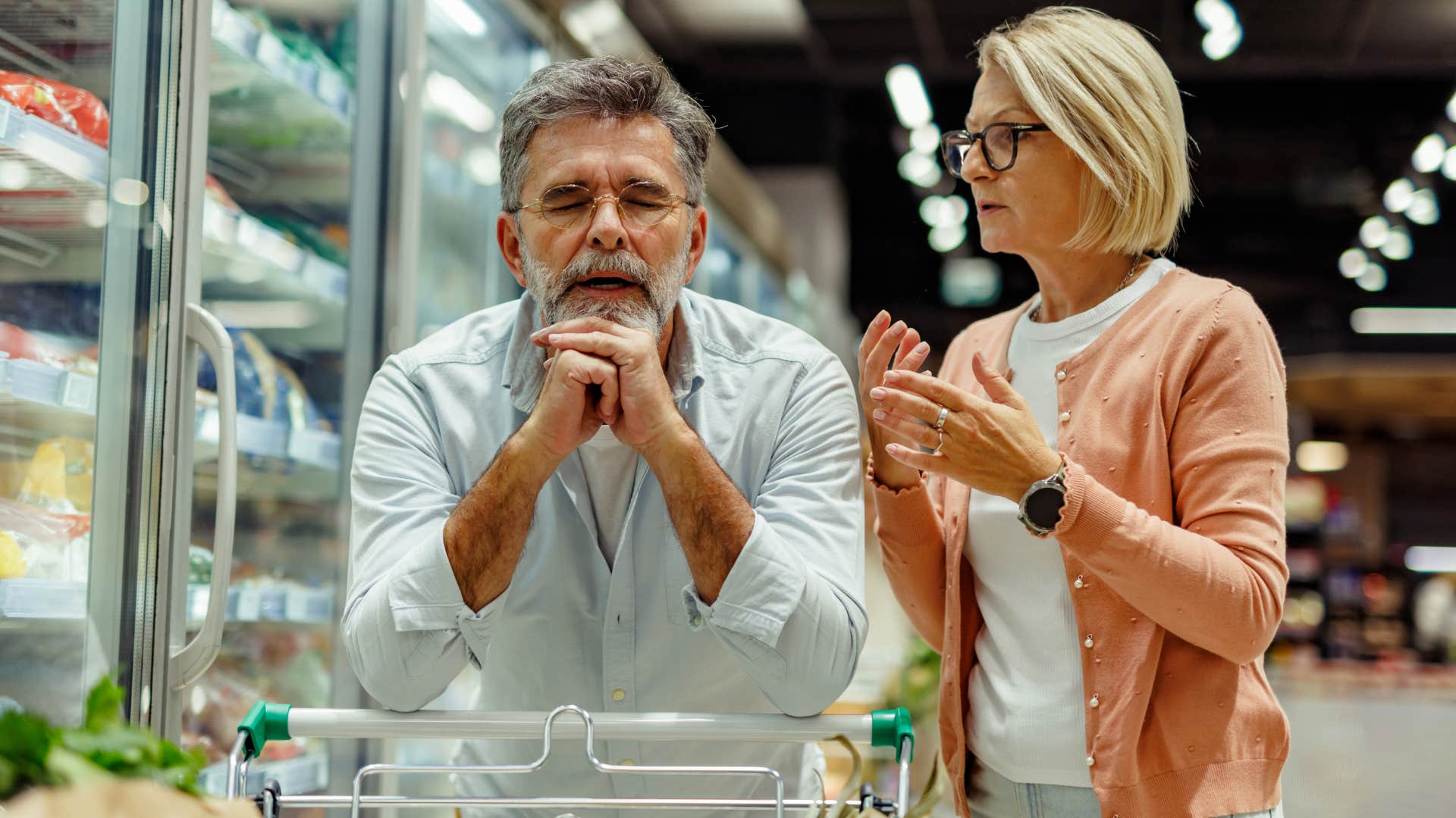 upset man saying I feel like we only ever argue to wife while shopping