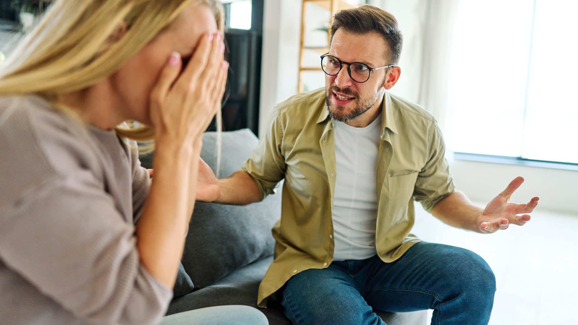 upset man explaining his feelings to his wife