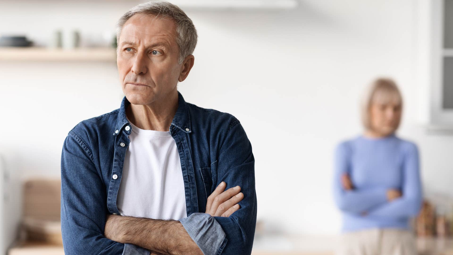 man feeling emotionally disconnected from his wife