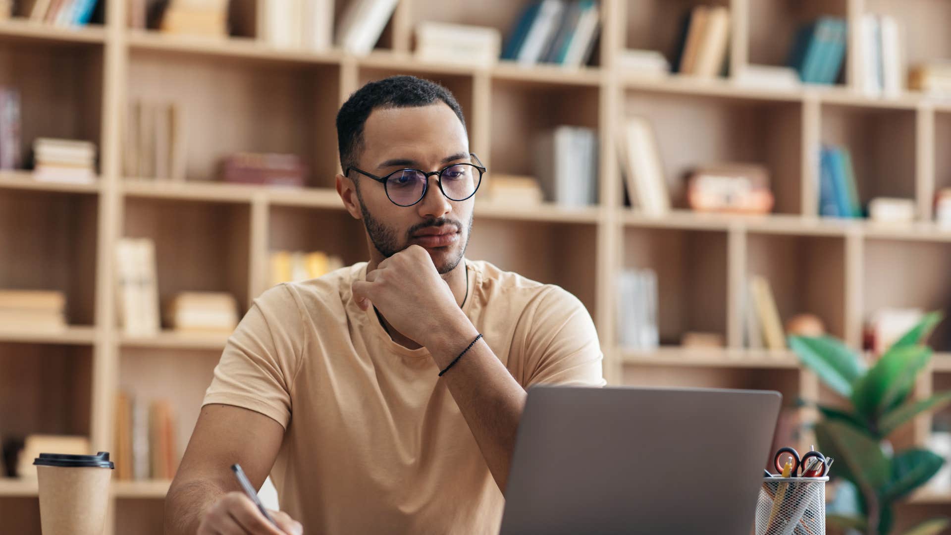 man doing work on laptop