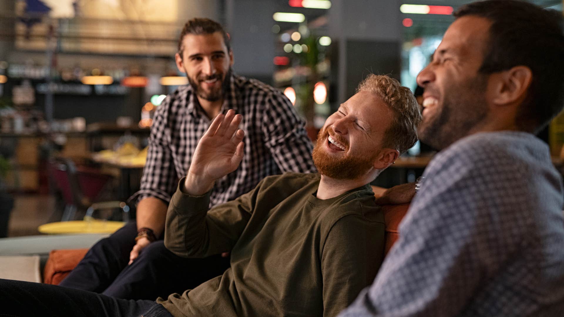group of men laughing together