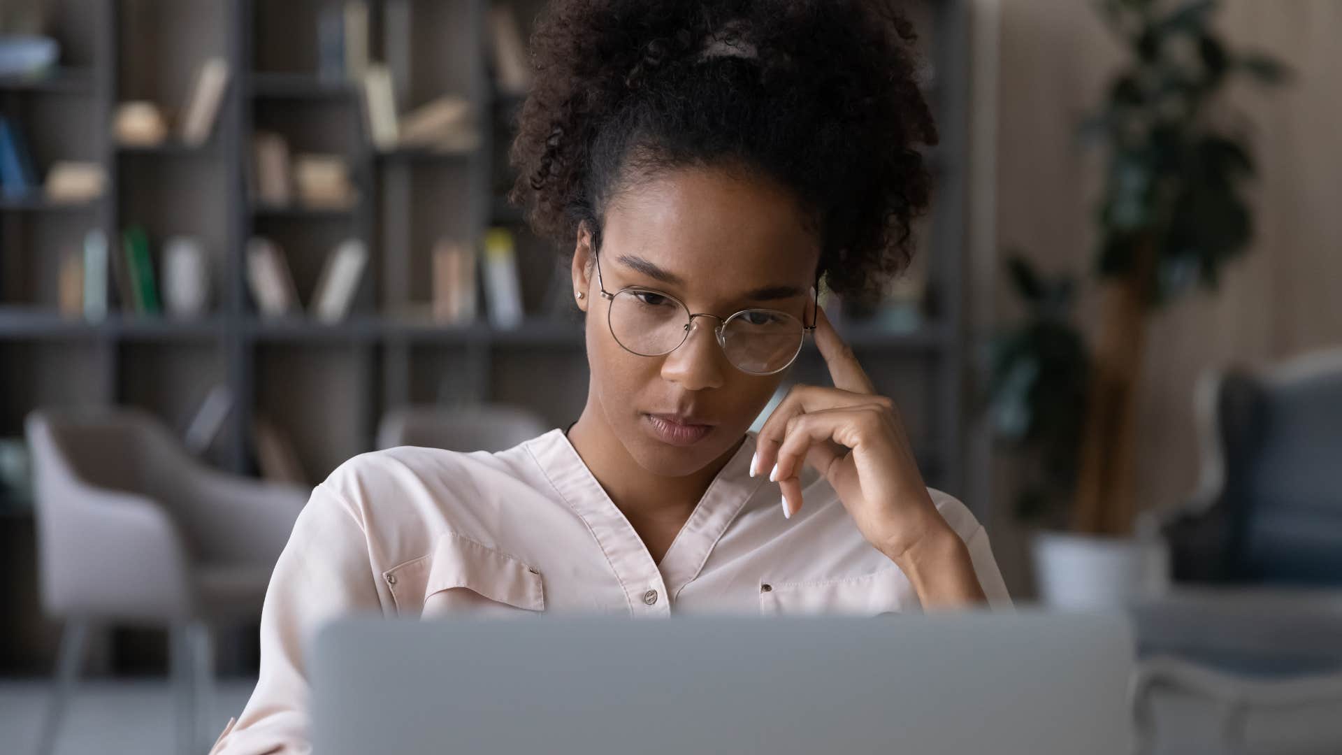 Woman who makes decisions without him looking at her computer.