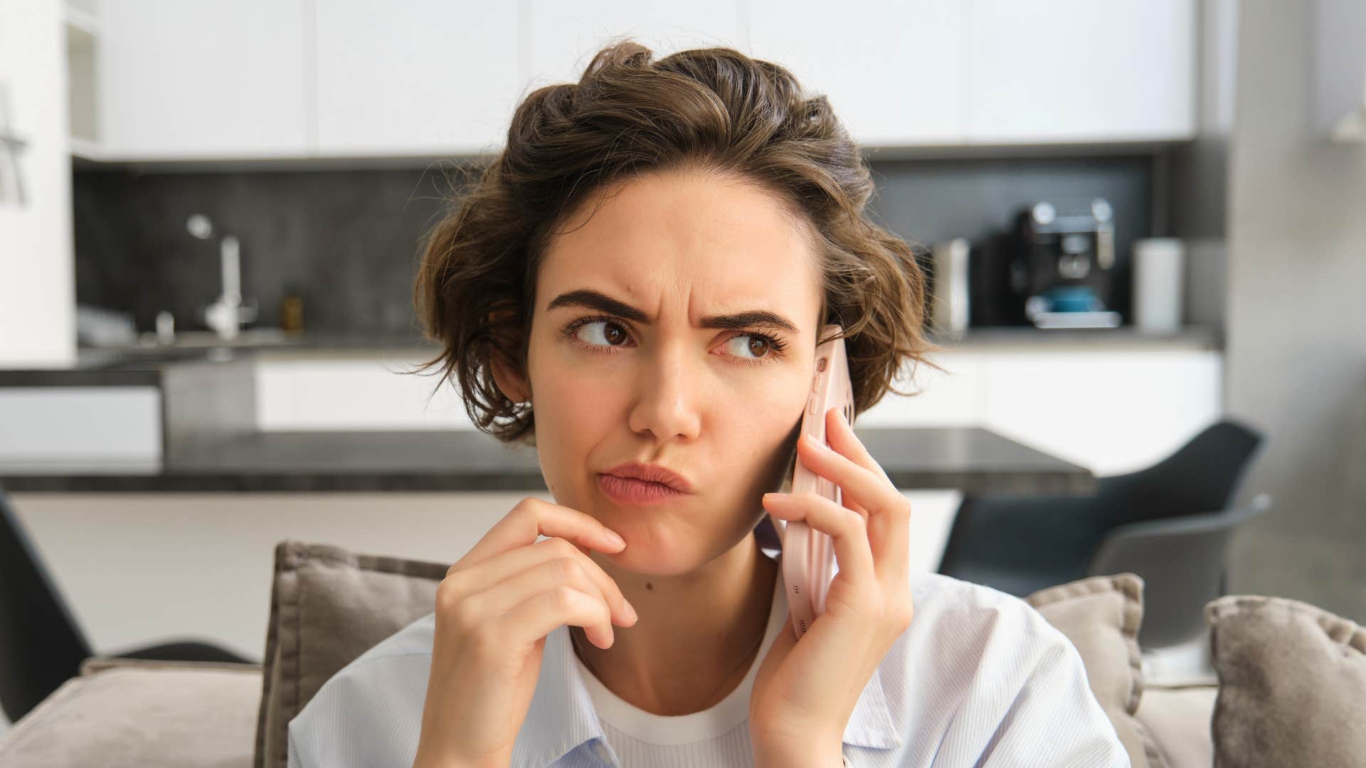 woman forming her own opinions and perspective on the phone