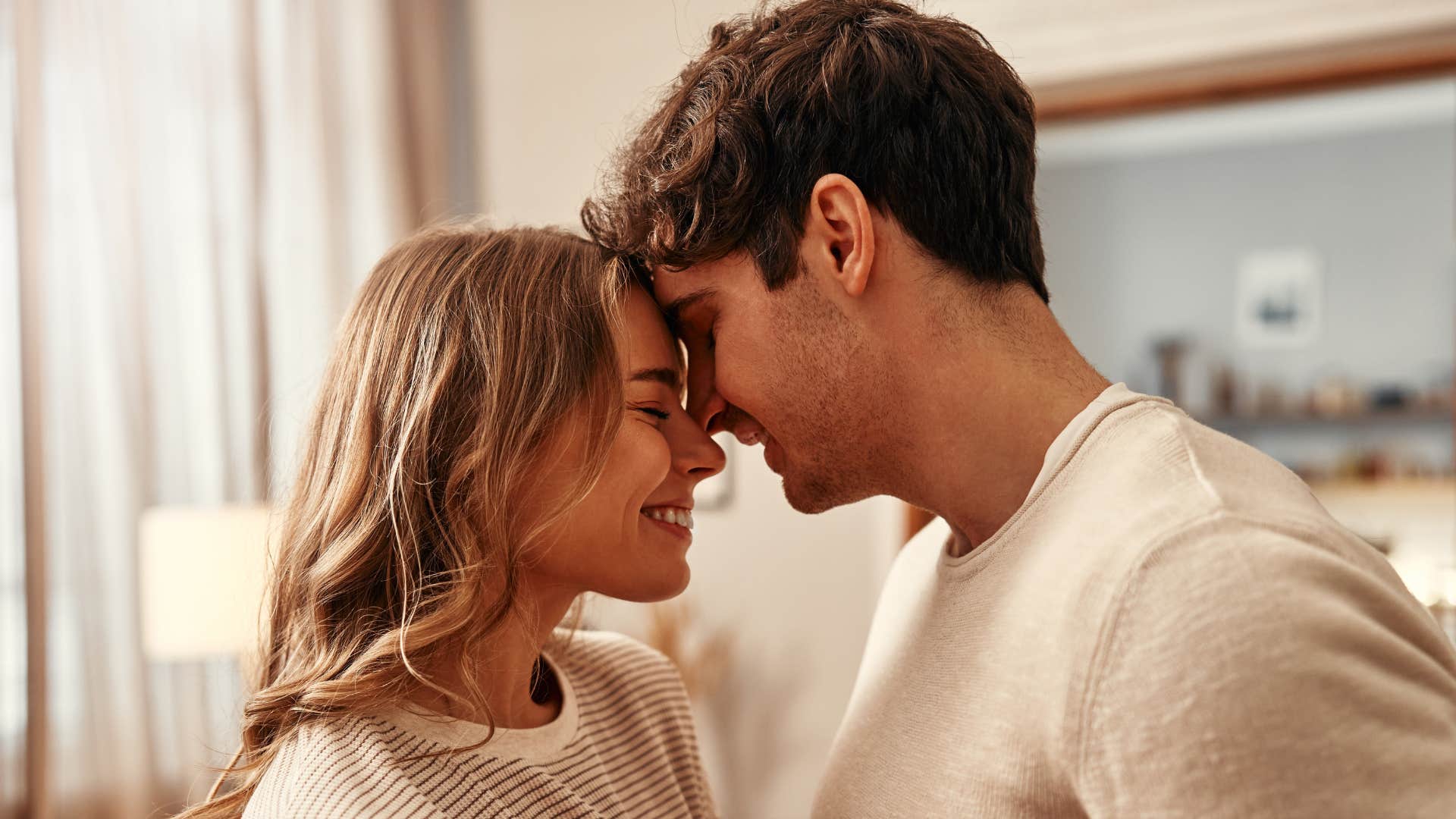 Couple in love smile after kiss