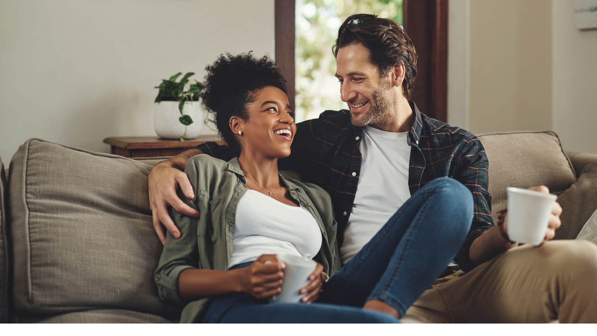 Man falling in love makes woman smile