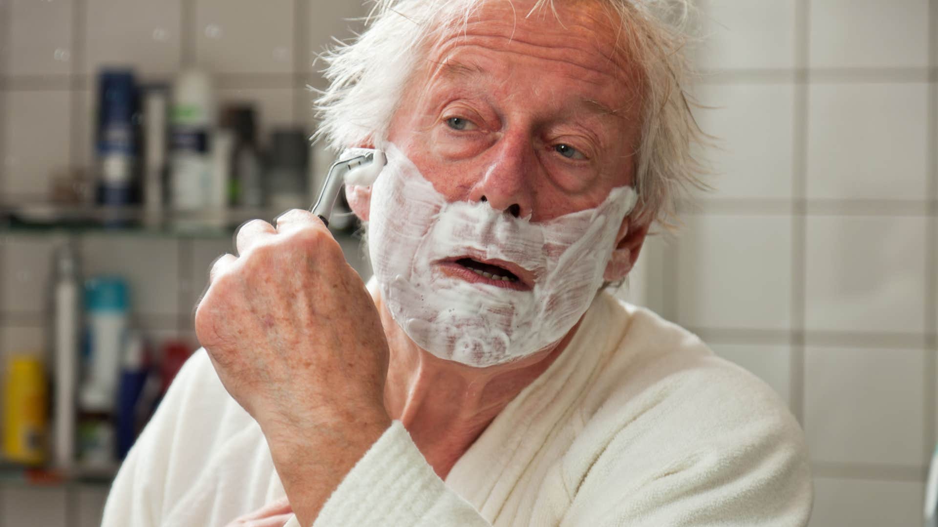 old man shaving
