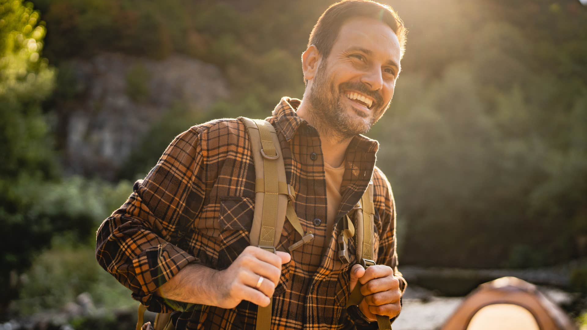 man on a hike searching for meaning