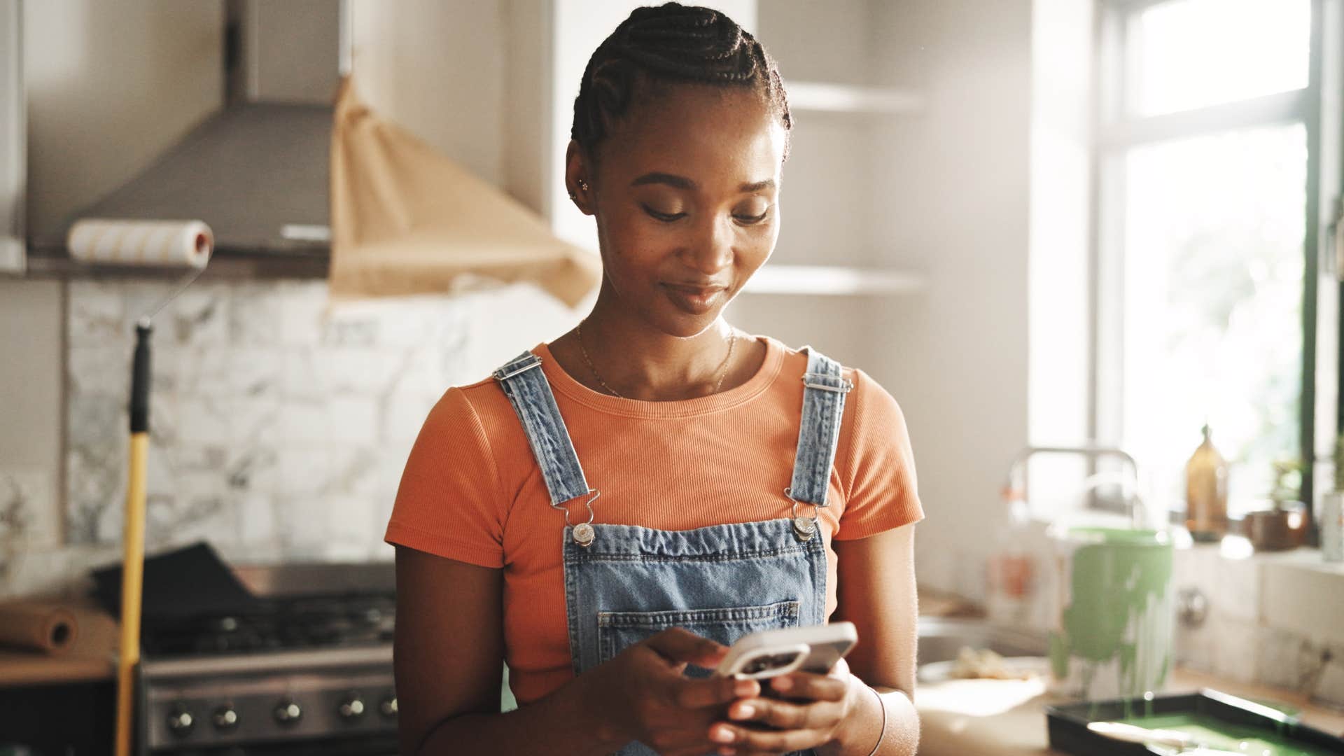 woman talking to herself smiling at home