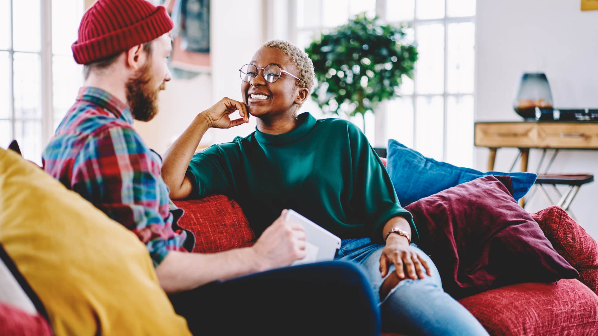 if someone who doesn't like you is too polite to admit it, they'll start saying these things casually sure, whatever you think is best two friends having casual conversation on couch