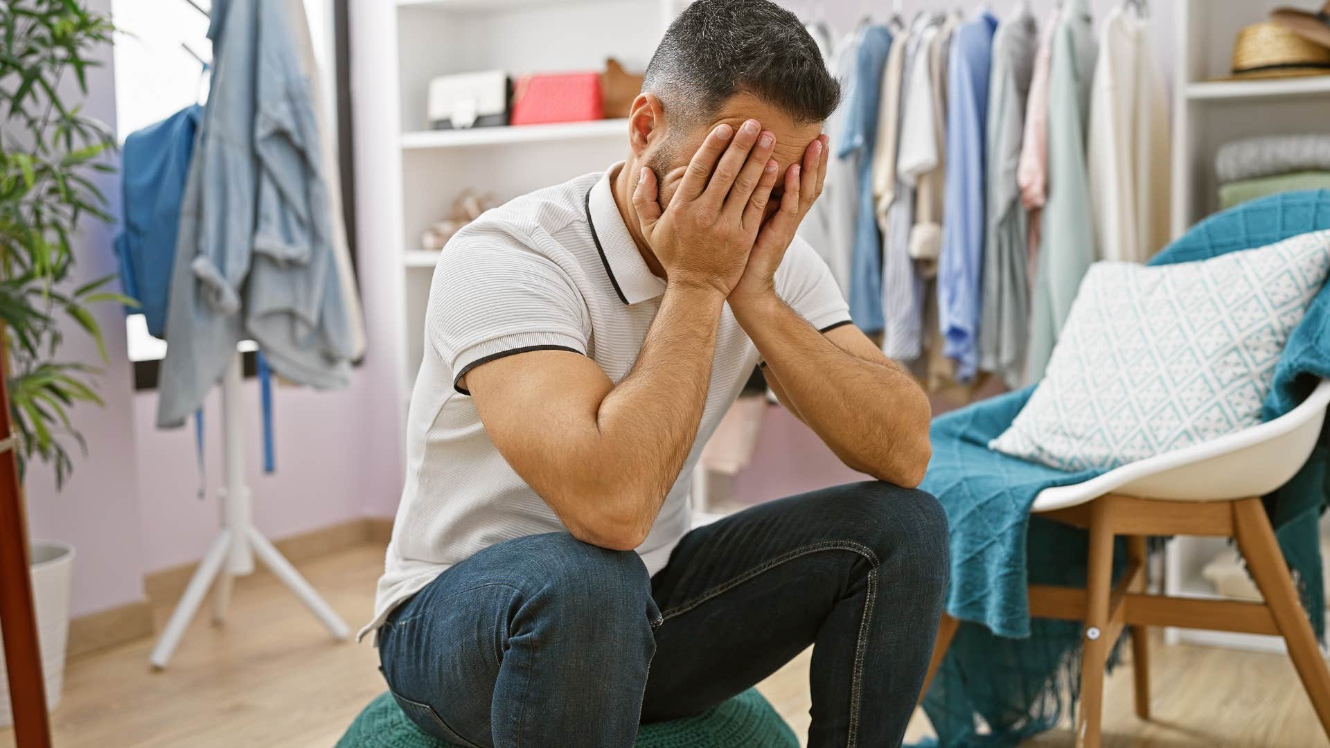 Man sitting with unfinished projects everywhere at home.