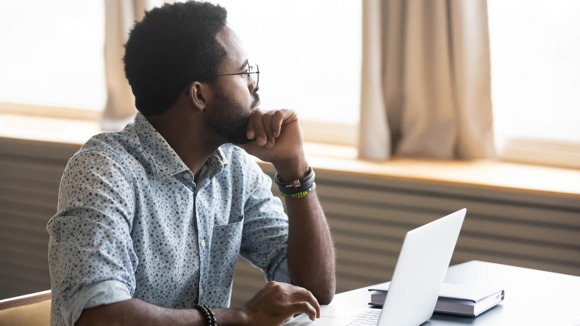 working man daydreaming about a weekend without plans