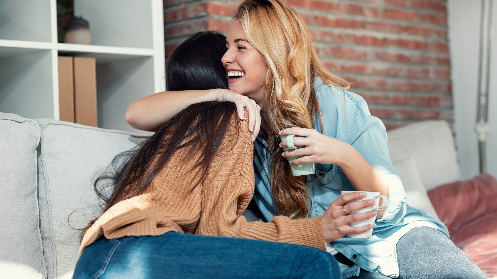 woman telling her friend to let her know if she ever treats her differently