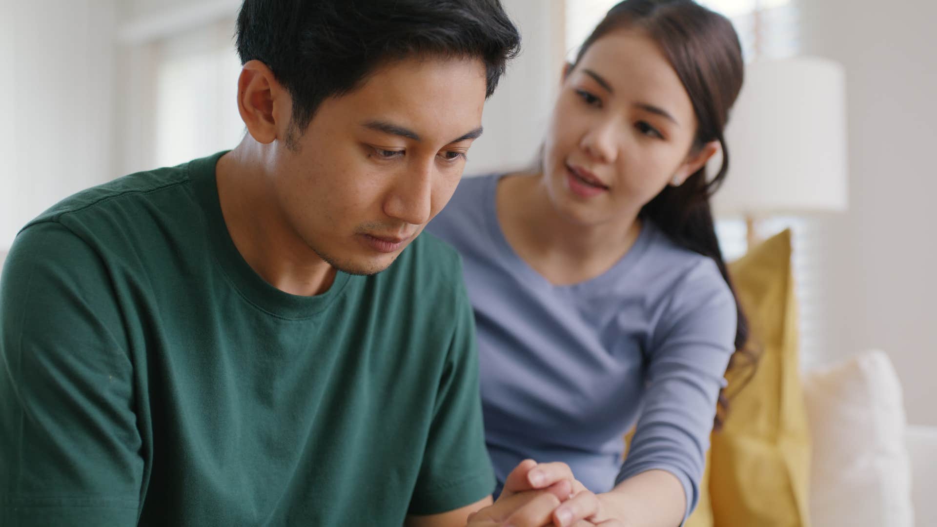 woman asking husband how she can help