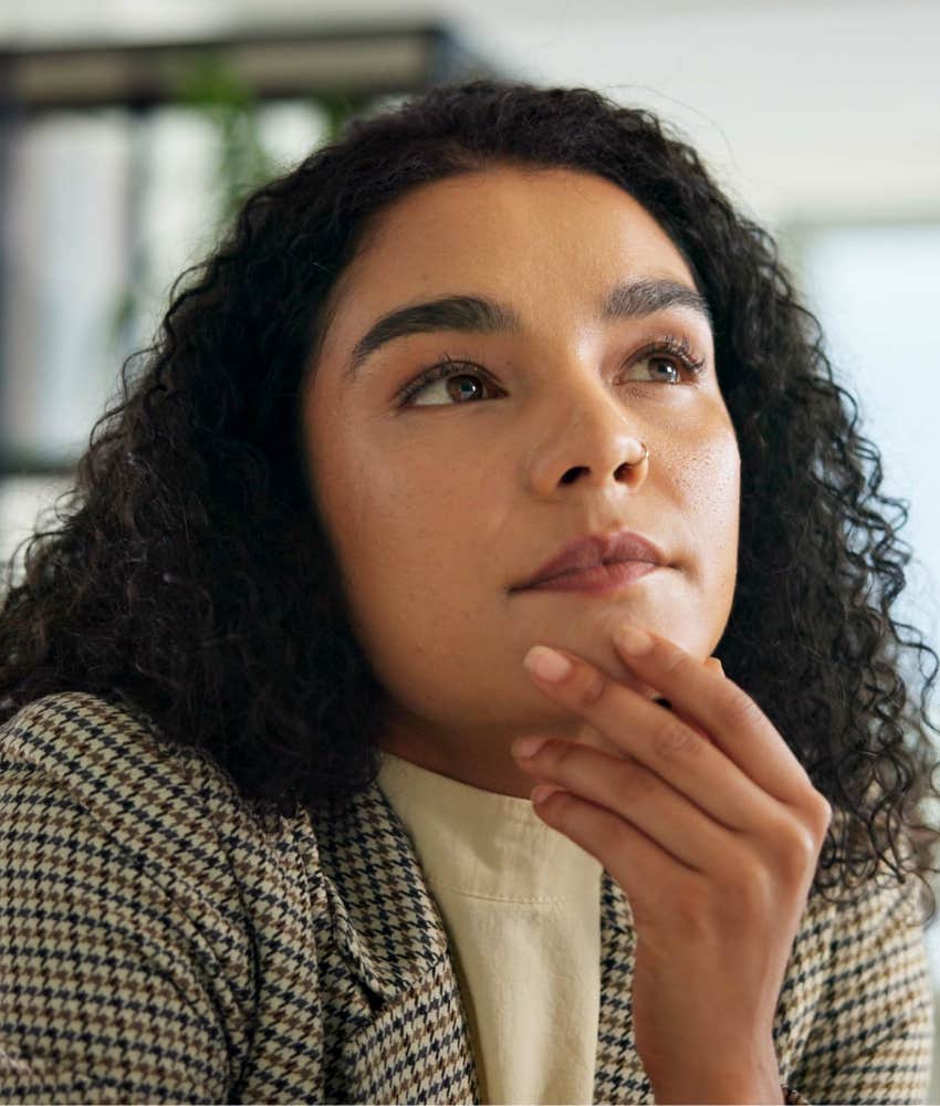 Woman thinks of questions to ask guy