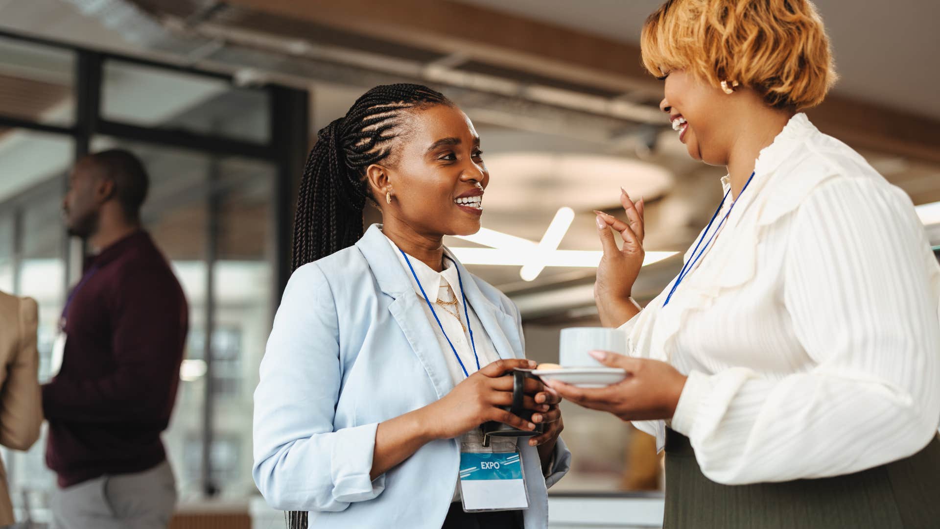 woman smiling at a networking event