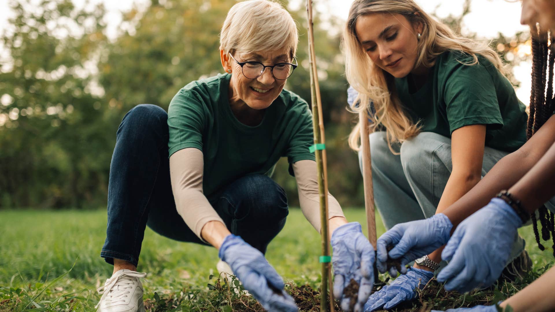 friends doing volunteer work outside
