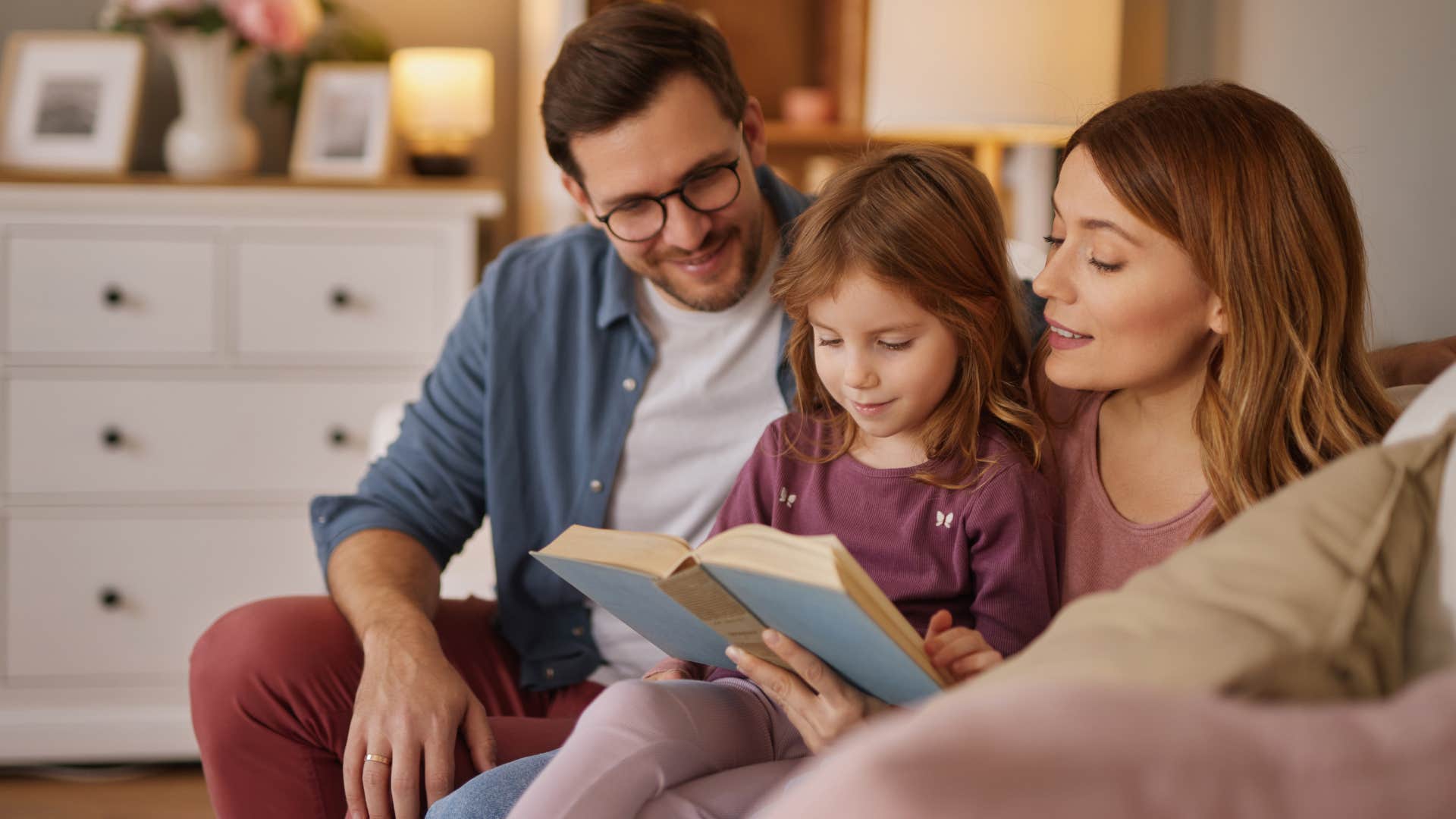 woman finding peace with her family reading to daughter