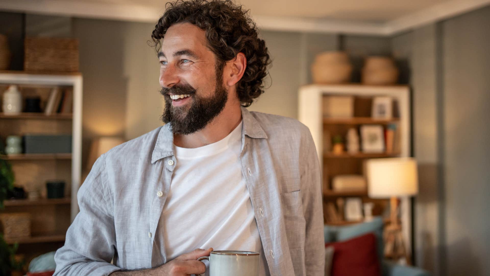 sentimental man smiling thinking about good times