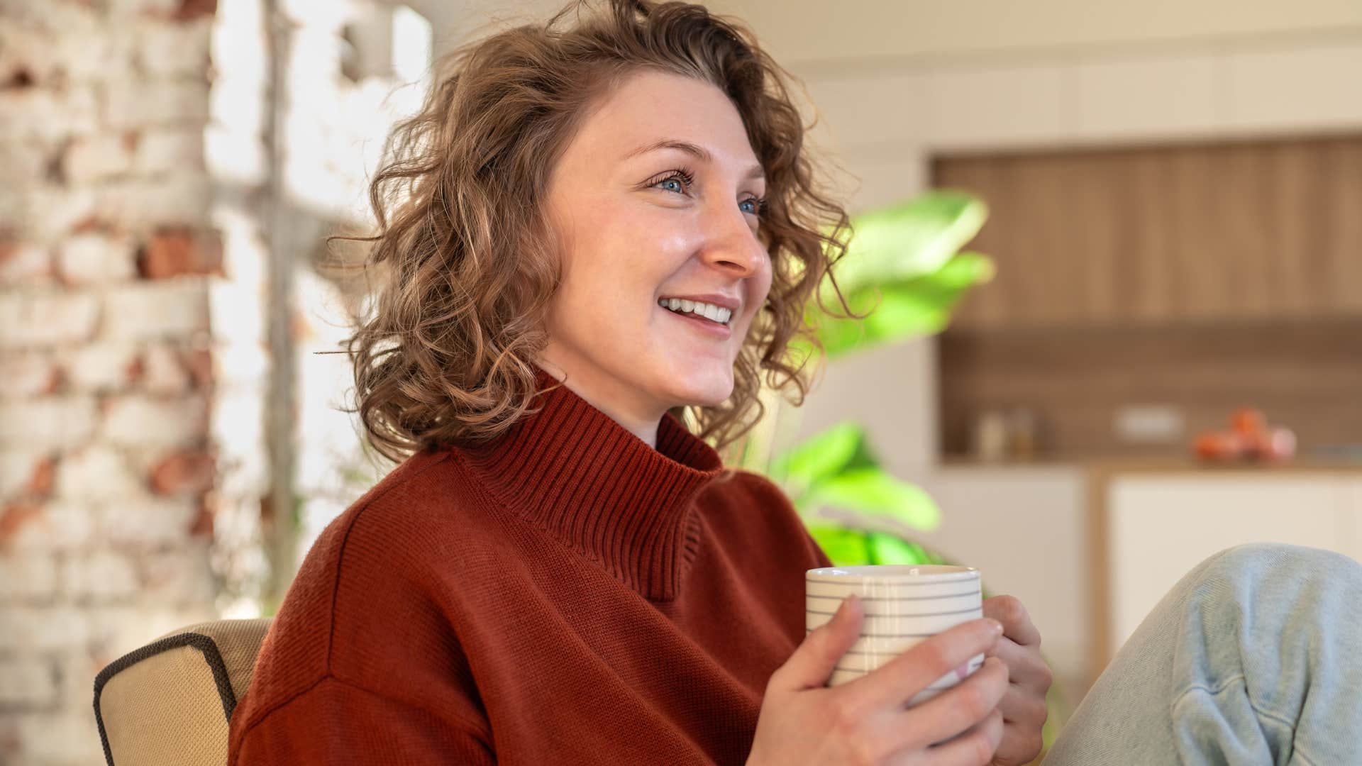 woman who understands aesthetics sitting in nicely decorated home