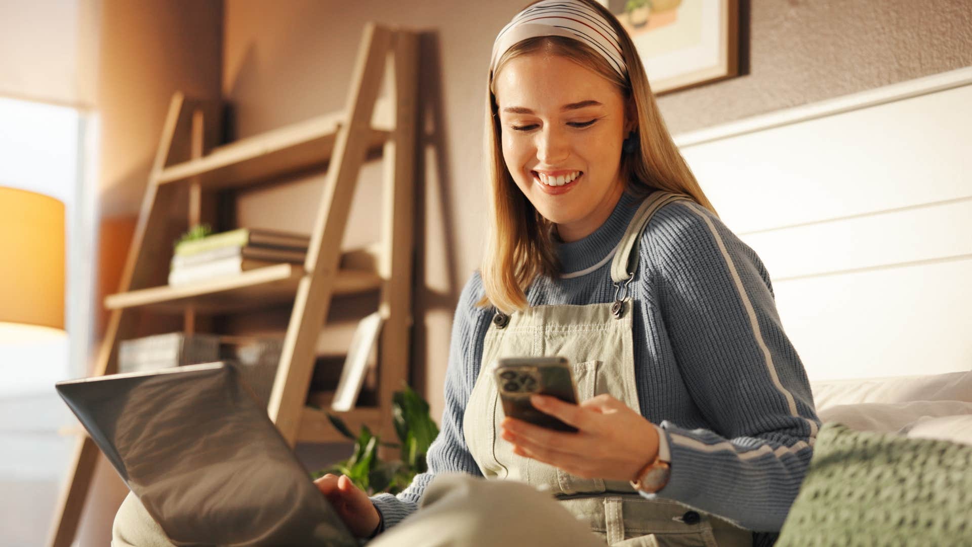Sentimental woman smiling in her bed.