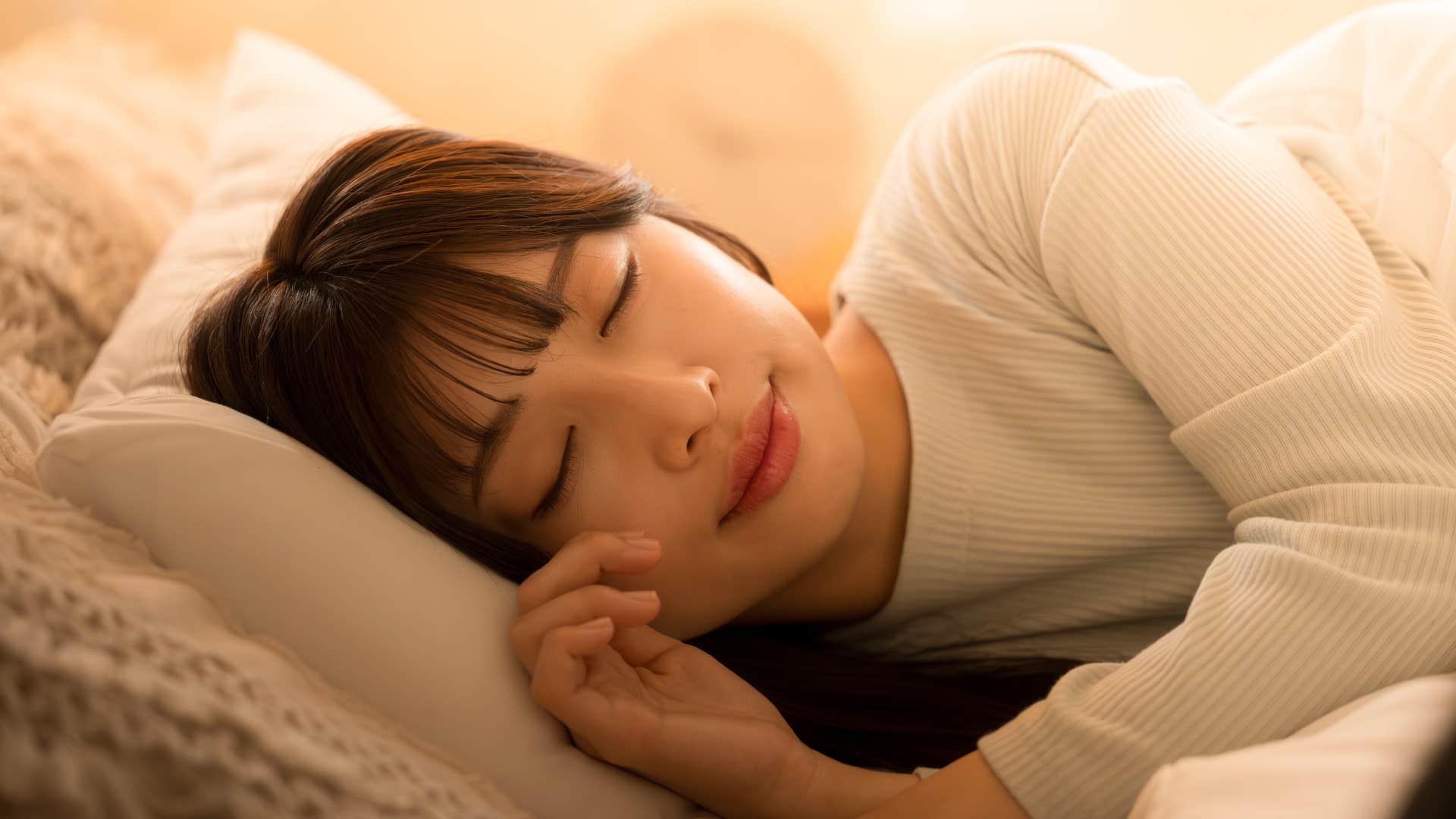 Woman who has strong preferences sleeping in bed.