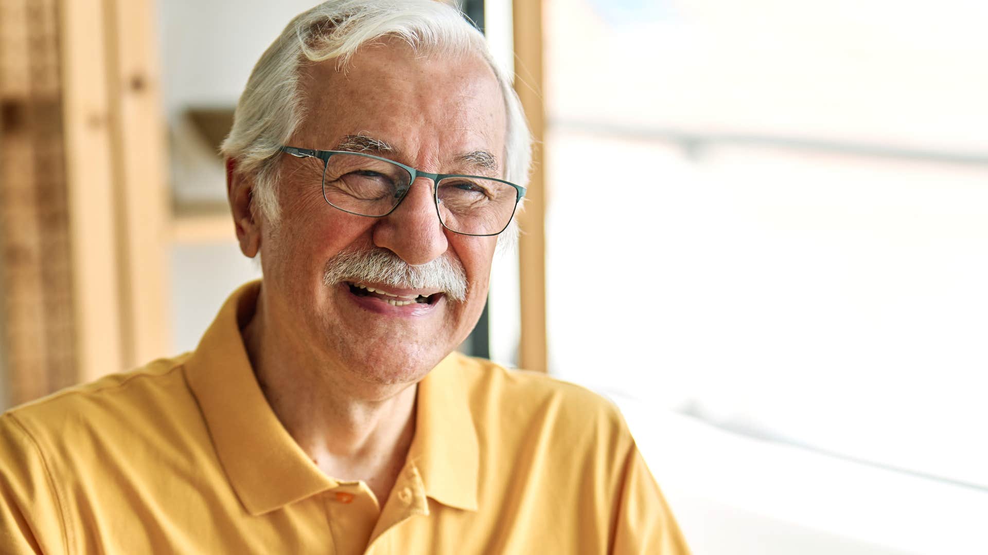 smiling man finding meaning in the small things