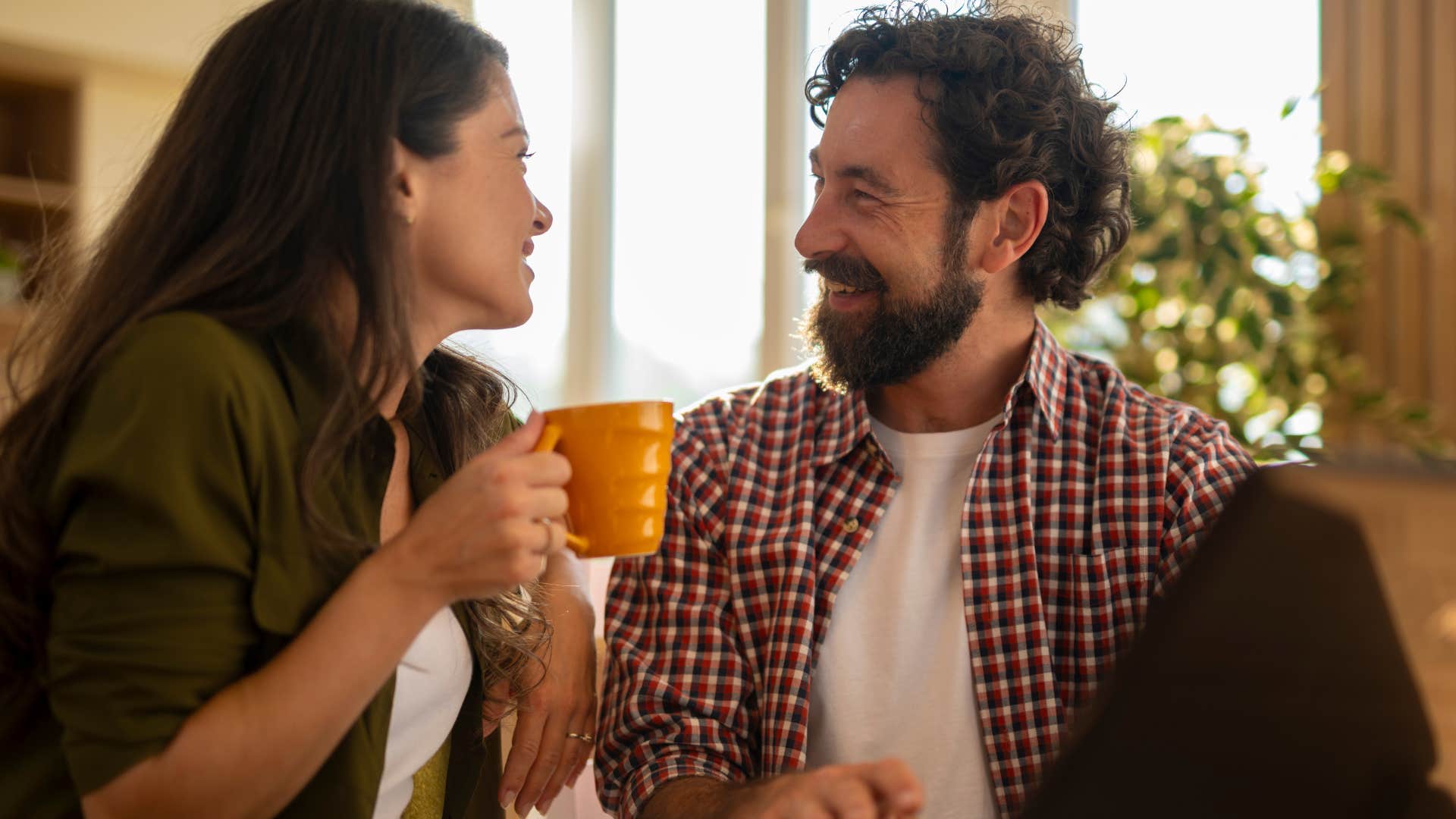 highly empathetic woman smiling with her partner