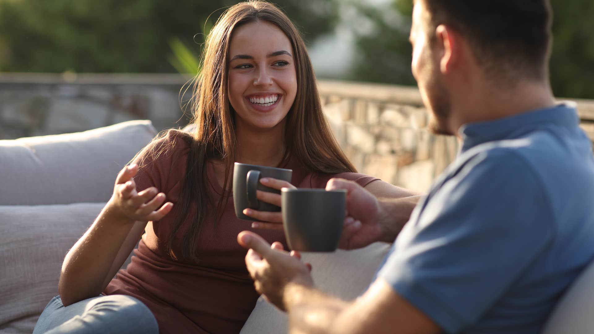 intuitive woman talking to her partner over coffee