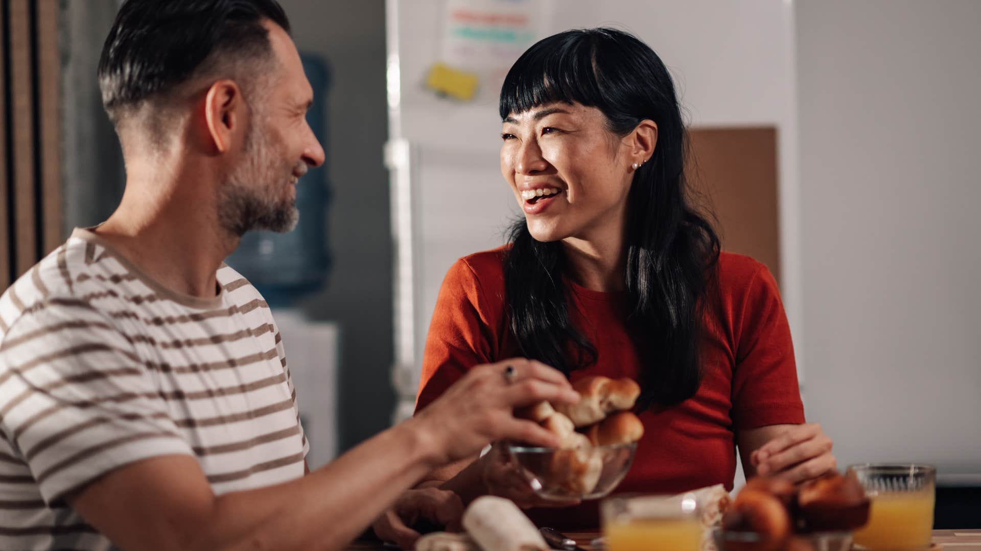 woman who values emotional honesty smiling with her partner